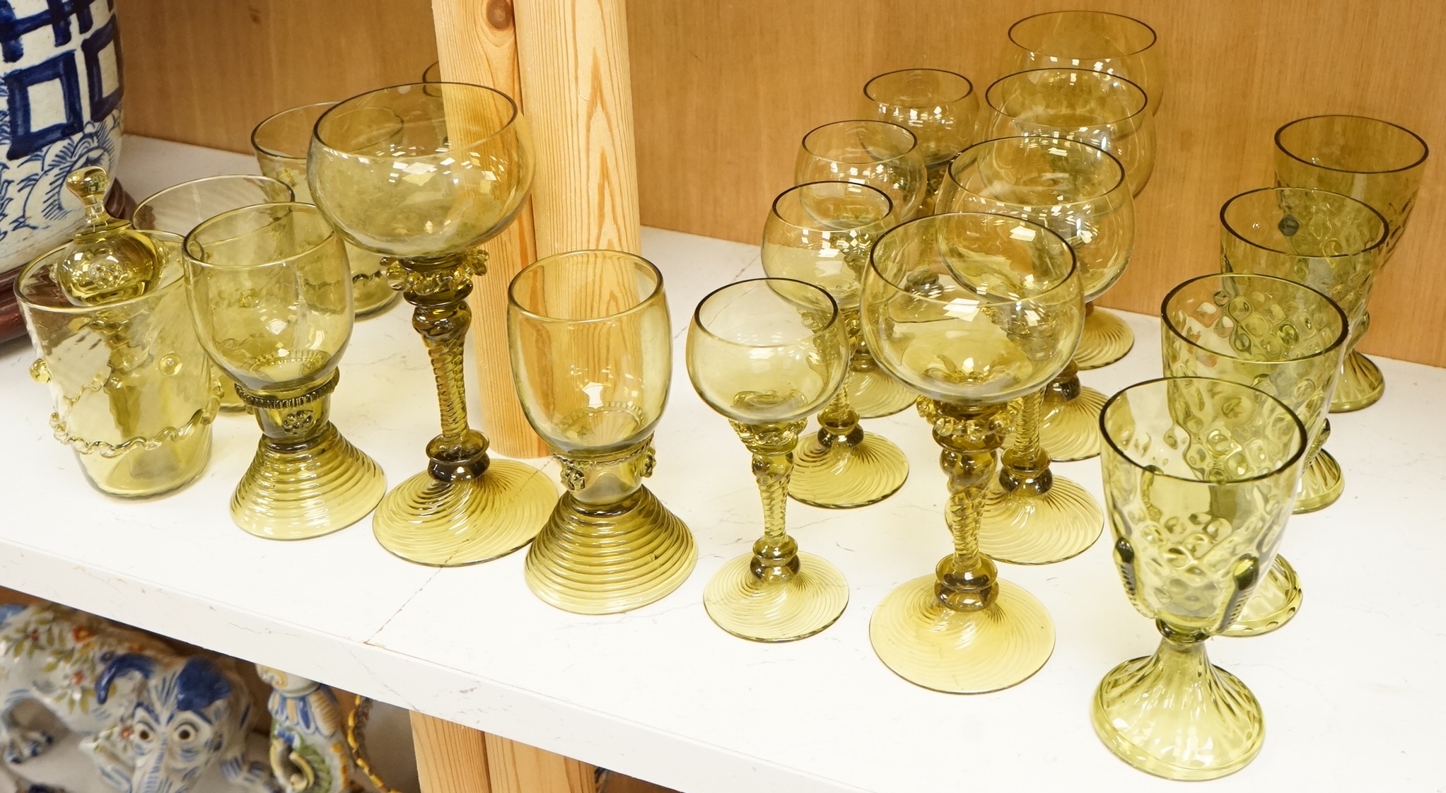 A collection of Continental green glassware to including hock glasses and tumblers, largest 17cm high